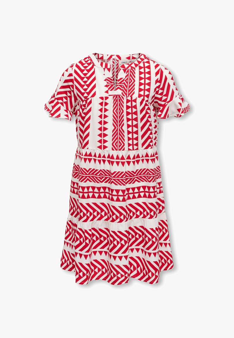 Robe blanche à manches courtes avec jupe à volants et motifs tribaux géométriques rouges, avec un col rond et une fermeture éclair sur le devant.