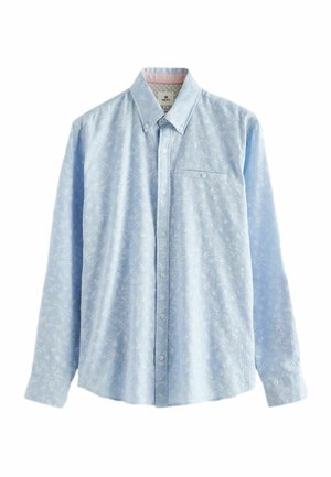 Light blue long-sleeve shirt in a cotton blend, featuring a subtle leaf pattern, button-up front, and a single chest pocket.