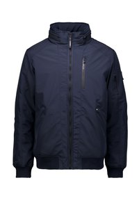Marineblau isolierte Jacke mit hohem Kragen, Frontreißverschluss und mehreren Reißverschlusstaschen. Hergestellt aus robustem, glattem Stoff mit gerippten Bündchen.