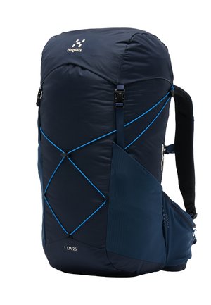 Zaino da trekking Haglöfs L.I.M 25 blu scuro con cordini elastici frontali, tasca laterale, spallacci imbottiti e cintura in vita.
