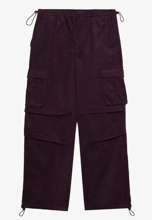 Purple corduroy cargo pants with an elastic waistband, two side pockets, and adjustable drawstrings at the ankles. Textured fabric.