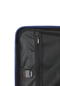 Black zippered briefcase with a textured interior, blue edges, and a logo label. Features mesh and smooth finishes, providing organization.