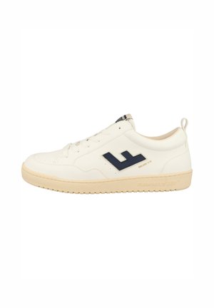 White leather sneaker with navy accents, textured sole, and lace-up design. Features a branded logo on the side and a heel loop for easy wear.