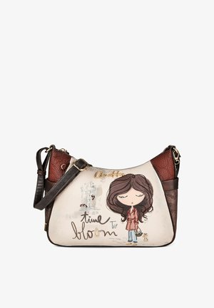 Handtasche mit einem Cartoon-Mädchen, das einen Korb hält, kleine Katze, braune Akzente und dem Satz "time to bloom" auf der Vorderseite.
