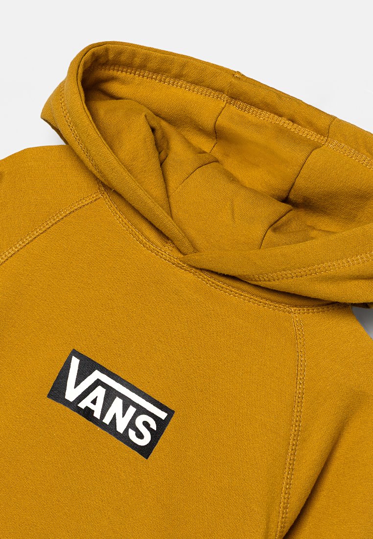 Sudadera de algodón amarilla con un gran logo negro de Vans en el frente, que cuenta con una capucha ajustable y puños acanalados. Textura suave, diseño casual.