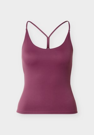 Lillakas varrukateta top, millel on õhukesed rihmad ja Y-kujuline seljatagune detail, valmistatud siledast, venivast kangast.