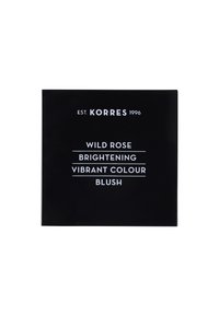 Black compact with white text. Reads "Wild Rose Brightening Vibrant Colour Blush" and "Est. Korres 1996." Square shape and smooth surface.
