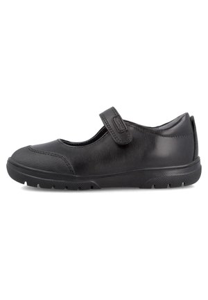 Zapato de cuero negro con punta redondeada, cierre de tiras de velcro, capuchón texturizado y suela de goma con pequeños patrones de frenado.