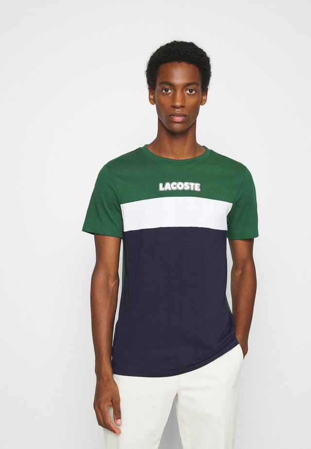 T-shirt con stampa - dark green/dark blue/white