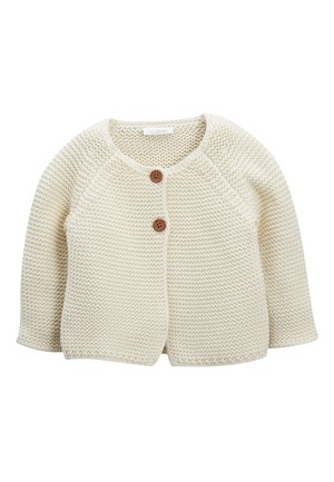 Cardigan en tricot de couleur crème avec un motif texturé, encolure arrondie et deux boutons bruns à l'avant. Manches longues raglan.