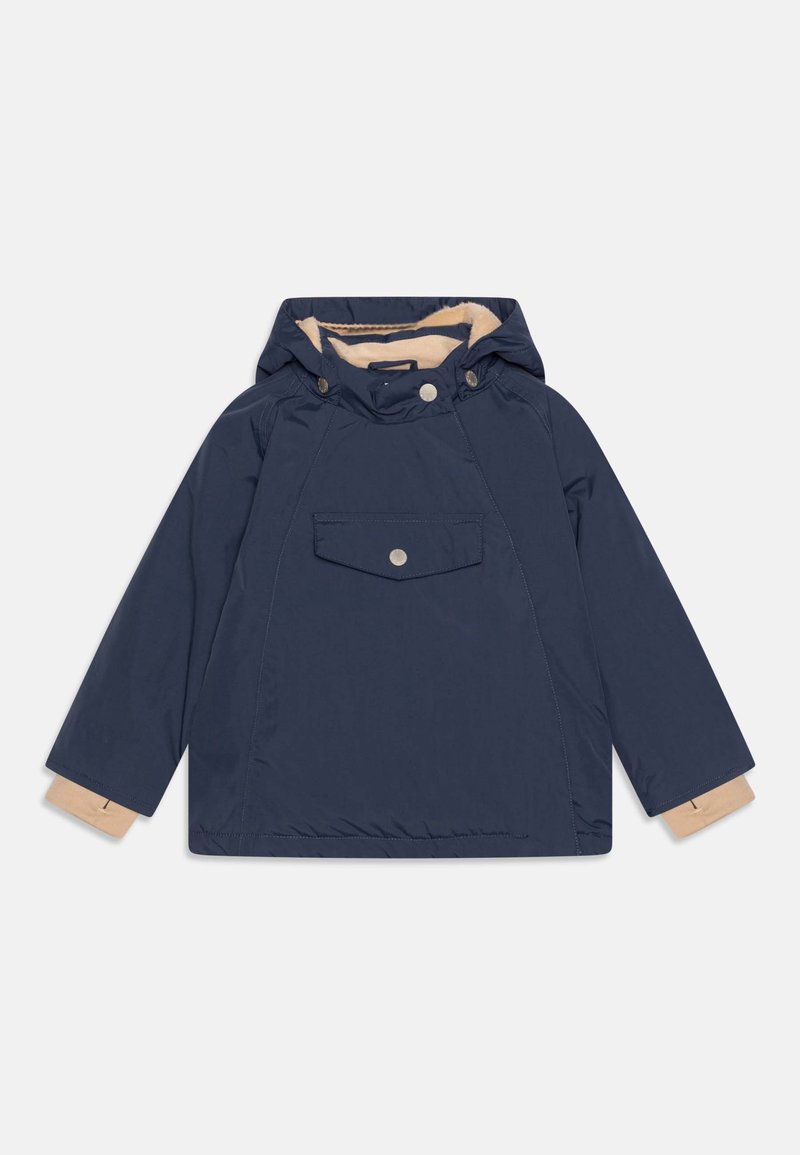 Veste à capuche bleu marine avec doublure intérieure beige, poche avant à rabat avec bouton-pression, manches longues et poignets réglables beige.