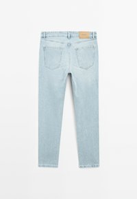 Light blue denim jeans, straight-leg design, five pockets, leather brand tag on back waistband, soft texture, and faded wash.