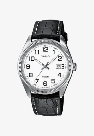 Casio ura z zlatom-tonsko nerjavečega jekla, bela številčnica, črn usnjen pas s krokodilnim vzorcem, velika črna številke, prikaz datuma.