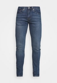 Herrarnas slim-fit blå denimjeans med framfickor, knapplås och subtil blekning vid låren och knäna.