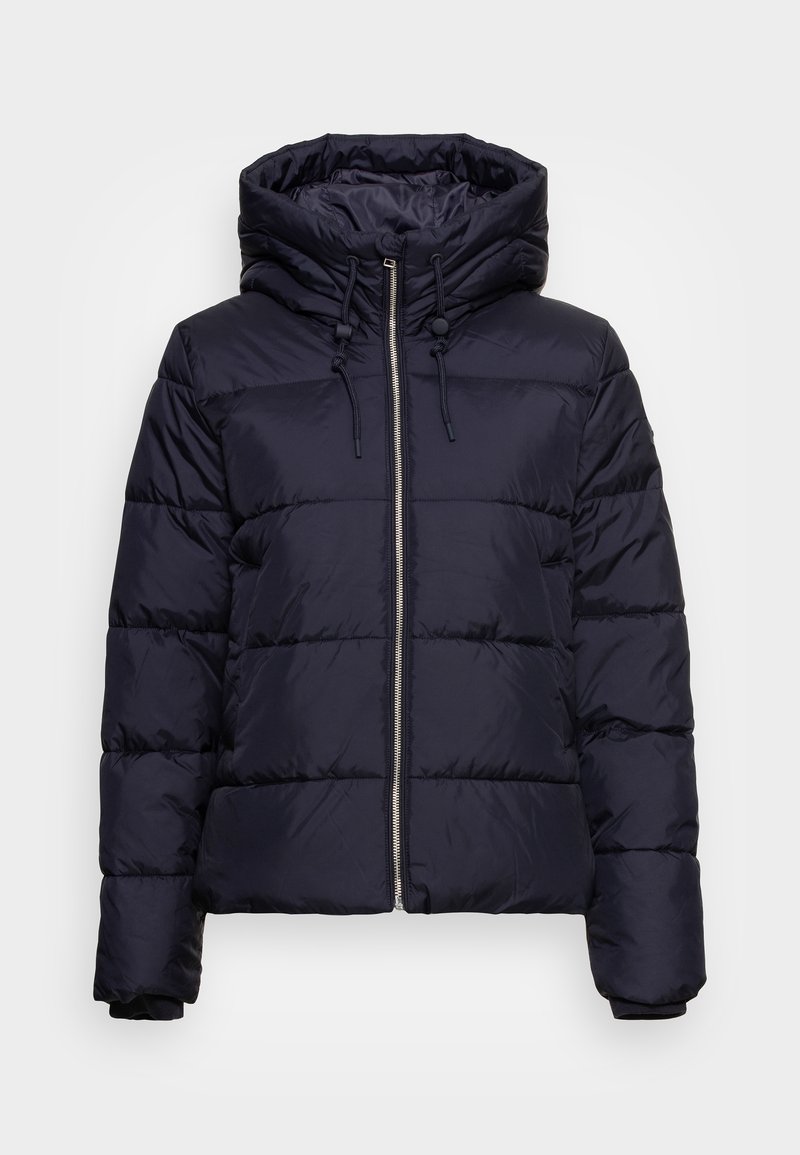 Giacca imbottita blu navy con colletto alto, chiusura frontale con zip e coulisse regolabili. Design imbottito con cuciture visibili.