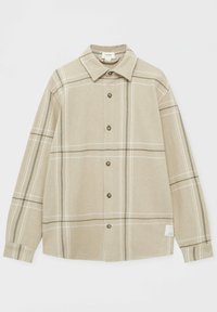 Chemise à carreaux beige avec un devant boutonné, un col et des manches longues. Présente des rayures vertes et blanches dans un motif contrastant. Texture douce.