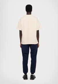 EA7 Emporio Armani UNISEX - Apdrukāts T-krekls - white