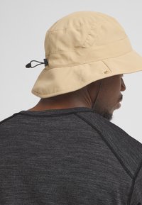 Jack Wolfskin Hoed - sand storm