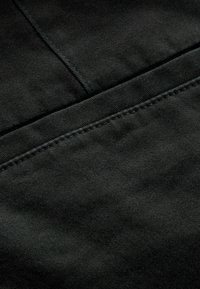 Next SLIM FIT PRINTED - Hlače chino - black