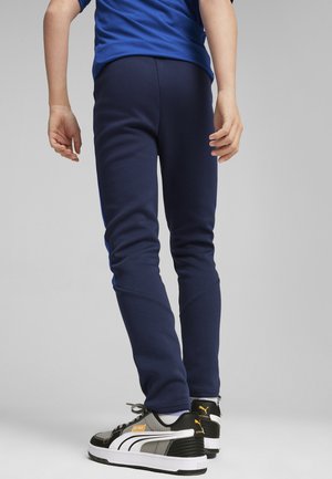 Puma EVOSTRIPE YOUTH - Jogginghose - club navy