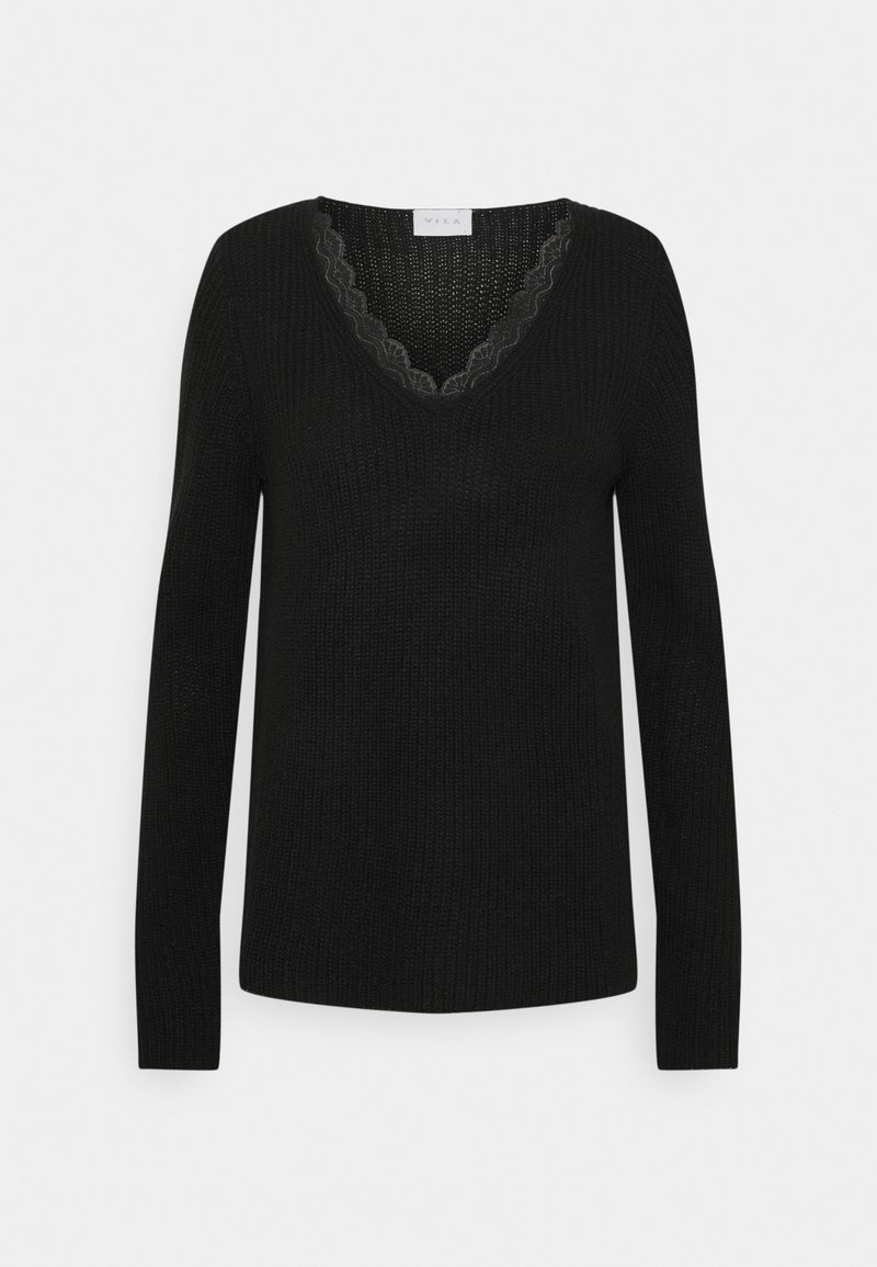 Svart långärmad stickad tröja med V-ringning, prydd med delikat spetskant längs halslinningen, från märket Vila.