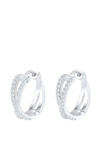 Les boucles d'oreilles créoles en argent présentent un design incurvé avec une rangée de petites pierres transparentes le long d'un bord pour une étincelle supplémentaire.