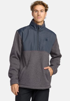 Fleece pullover in donkergrijs en marineblauw met een half-rits, hoge kraag, kangoeroezak en gestructureerde stof boven de taille.