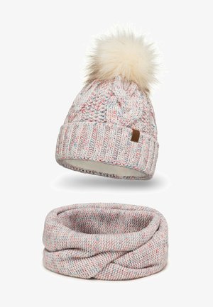 Strikket hat med en cremefarvet faux fur pom-pom, farverigt spottet mønster og et matchende infinity tørklæde i blødt, struktureret strik.