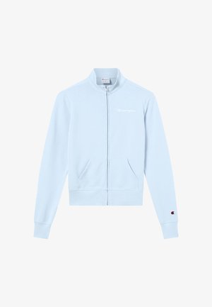 Sudadera azul claro con cremallera hecha de tela suave. Cuenta con un cuello alto, dos bolsillos delanteros y un pequeño logo en el pecho izquierdo.