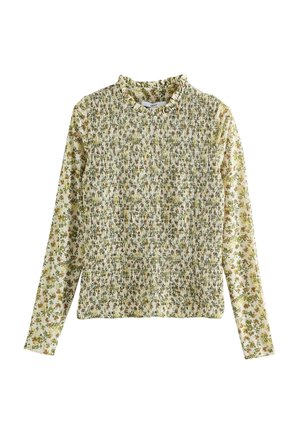 Haut à manches longues à motif floral avec un panneau avant smocké et un col à volants dans des tons vert clair et marron sur fond crème.