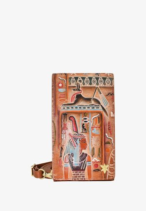 Brown leather wallet featuring embossed Egyptian motifs and colorful detailing. Includes a detachable strap and notable textured surface.