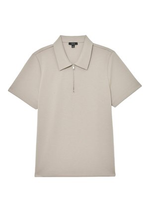 Rövid ujjú galléros póló világos bézs anyagból, cipzáras gallérral, sima textúrával és mintát nélkülöző minimalista dizájnnal.