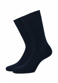 Granatowe skarpetki bawełniane z prążkowanym mankietem, w jednolitym kolorze, o gładkiej fakturze oraz wzmocnionym palcem i piętą, zapewniającym trwałość.