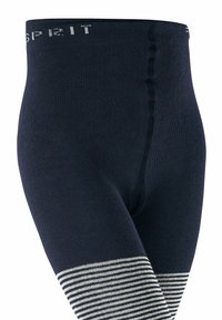 Leggings en maille marine avec une large ceinture côtelée et des rayures verticales texturées en couleurs plus claires sur le bas des jambes.