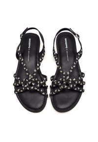 Sandales noires à brides en tissu texturé, ornées de petits accents décoratifs, dotées d'une semelle plate et rembourrée pour le confort.