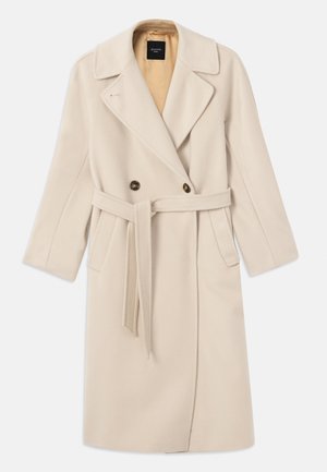 Manteau beige en mélange de laine, à double boutonnière, avec grands revers, deux boutons, poches avant et une ceinture assortie. Doublé d'une teinte plus claire.