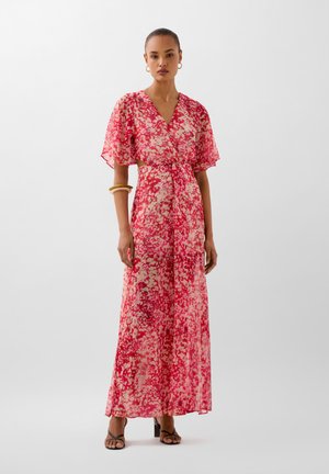 Maxi-jurk van doorzichtig materiaal met een abstract patroon in roze en crème, met vloeiende mouwen, een strik taille en een soepel silhouet.