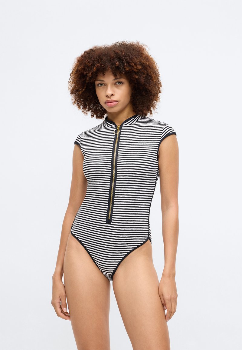 Costume Intero Da Ragazza Tween Con Raglio Incrociato E Stampa Tropicale | SHEIN ALIA