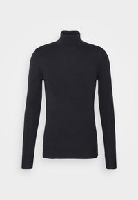 Maglione a collo alto nero realizzato in morbido tessuto a maglia, caratterizzato da maniche lunghe, una silhouette aderente e polsini e orlo a coste.