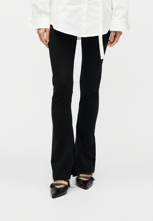 NUFLARE - Leggingek - Nadrágok - black