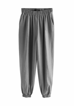 Pantalons gris, légers, avec taille élastique et coupe décontractée, dotés de poches latérales et de poignets élastiques aux chevilles. Texture douce.