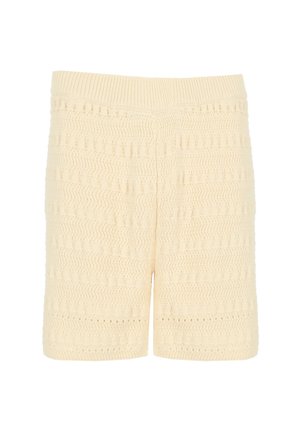 Shorts en tricot couleur crème avec un motif texturé en zigzag et carrés, et une taille côtelée.