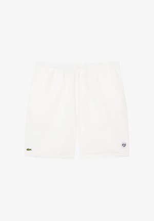 Witte shorts met elastische taille, zijzakken, een klein groen krokodillenlogo op het linkerbeen en een ronde marineblauwe en witte embleem op het rechterbeen.