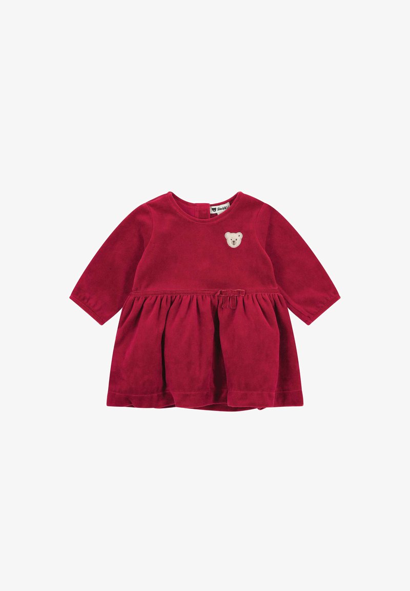 Rotes Velourskleid mit langen Ärmeln, ausgestelltem Rock, Schleifendetail in der Taille und einem Teddybär-Applikation auf der Brust.