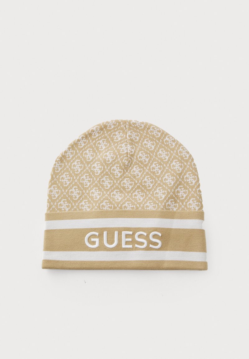Beige knitted beanie with repeating logo pattern and a white band featuring the brand name "GUESS" prominently displayed.