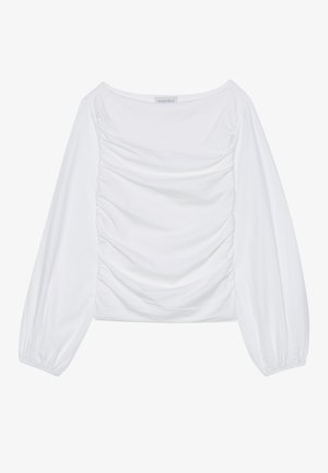 Fehér, hosszú ujjú felső, széles nyakkivágással és ráncolt részletekkel az elején. Puha anyagból készült, laza ujjak jellemzik.