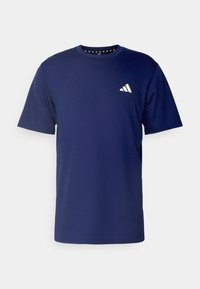 Navyblå kortärmad T-shirt i bomull. Har en vit Adidas-logga på vänster bröst och en texturerad krage med små detaljer.