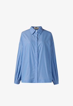 Lichtblauw overhemd met lange mouwen, fijne verticale marineblauwe strepen, puntkraag, verborgen knoopsluiting en losse pasvorm.