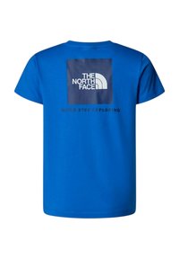T-shirt azzurro a maniche corte con grande logo quadrato de "The North Face" e slogan "Never Stop Exploring" sul retro.