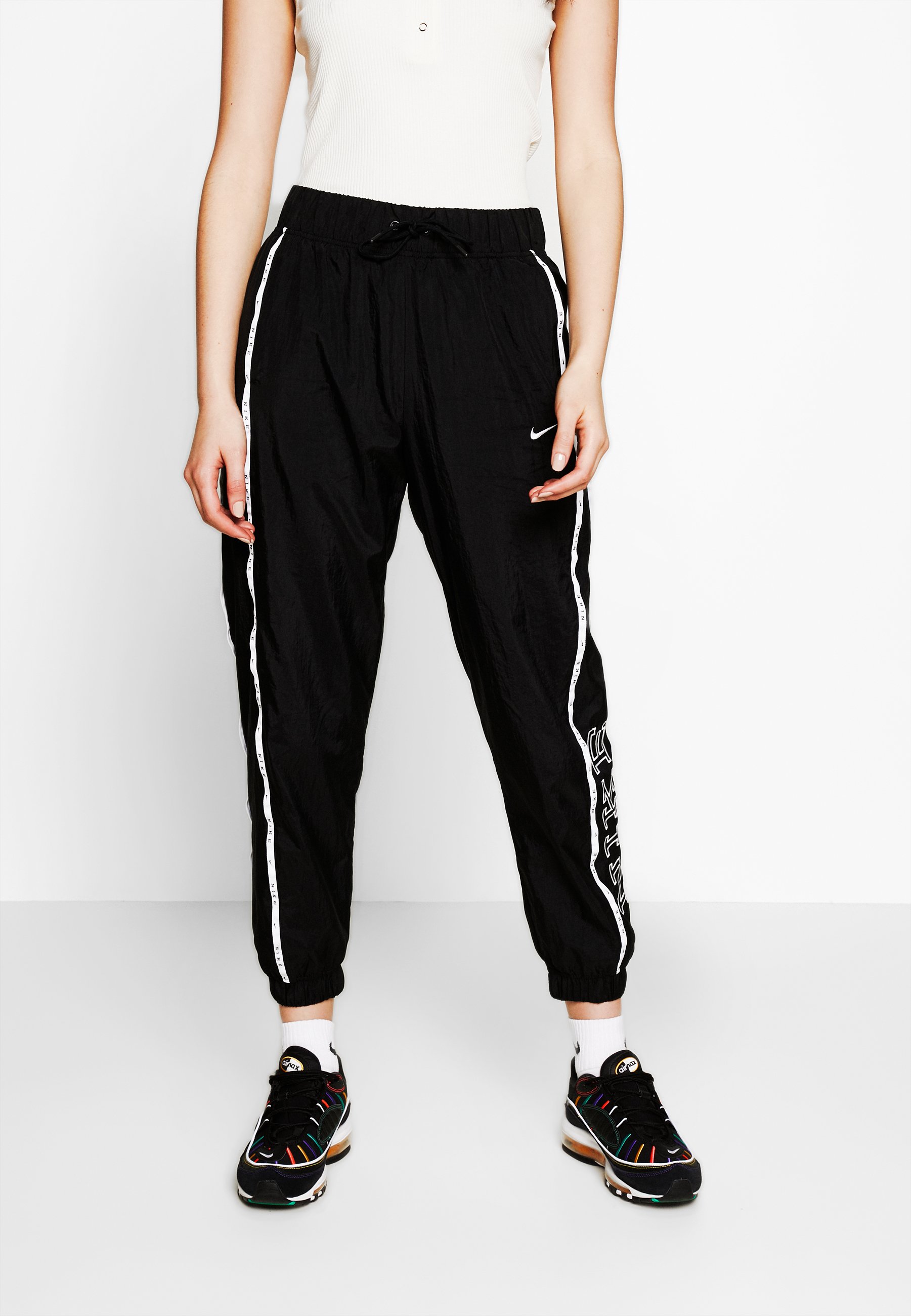 nike pant piping